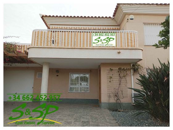 Foto 1 de Casa adosada en venta en Águilas ciudad de 4 habitaciones con terraza y piscina