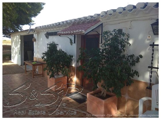 Foto 1 de Casa rural en venta en Calabardina de 3 habitaciones con terraza y jardín