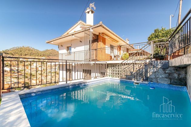 Foto 1 de Casa en venda a Santa Coloma de Cervelló de 4 habitacions amb terrassa i piscina