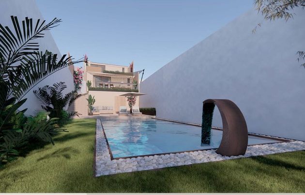 Foto 1 de Venta de casa adosada en Campanet de 4 habitaciones con terraza y piscina