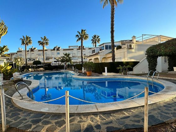 Foto 1 de Dúplex en venta en Playa Flamenca - Punta Prima de 3 habitaciones con terraza y piscina