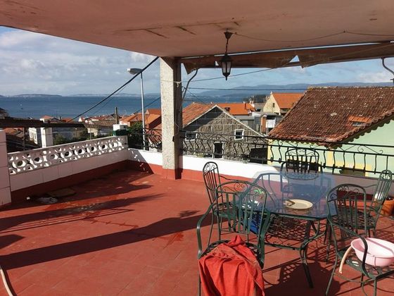Foto 2 de Venta de chalet en O Carril - Bamio de 5 habitaciones con terraza y garaje
