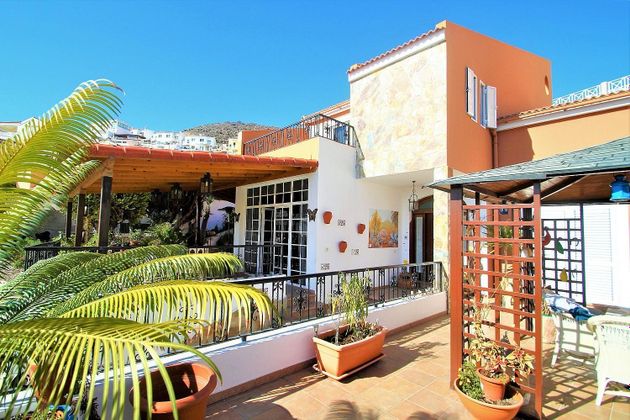 Foto 1 de Casa adosada en venta en Arguineguín de 3 habitaciones con terraza y piscina