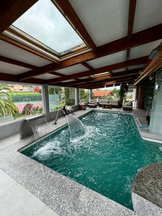 Foto 1 de Chalet en venta en Arteixo de 4 habitaciones con terraza y piscina