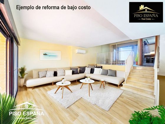 Foto 2 de Venta de casa adosada en Playa del Puig de 4 habitaciones con terraza y piscina