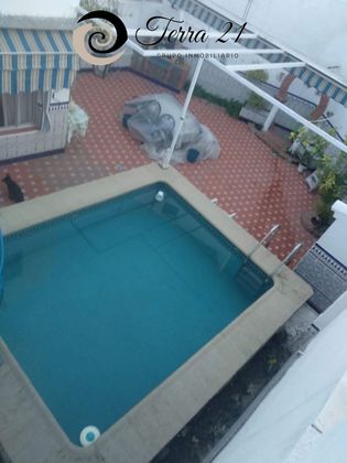 Foto 1 de Casa en venda a Mengíbar de 4 habitacions amb piscina i garatge