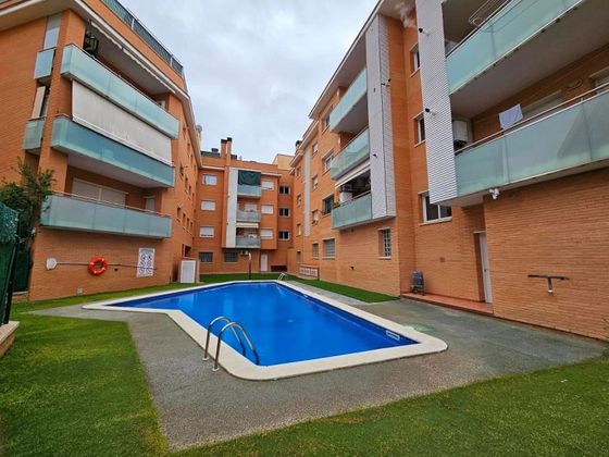 Foto 1 de Piso en venta en Rieral - Can Sabata de 2 habitaciones con piscina y garaje