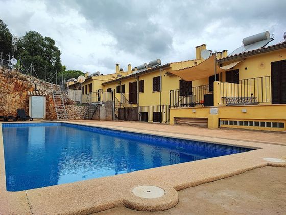 Foto 1 de Venta de casa adosada en Mancor de la Vall de 4 habitaciones con terraza y piscina