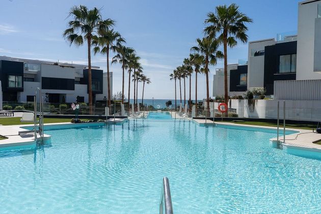 Foto 1 de Venta de chalet en urbanización Playa de Guadalobon de 3 habitaciones con terraza y piscina