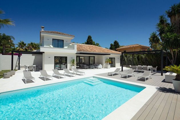 Foto 1 de Xalet en venda a Nueva Alcántara de 4 habitacions amb terrassa i piscina