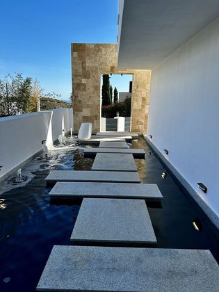 Foto 2 de Chalet en venta en calle Urbanizacion Santa Clara Golf de 6 habitaciones con terraza y piscina