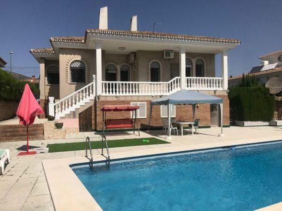 Foto 1 de Venta de chalet en Churriana de 6 habitaciones con terraza y piscina