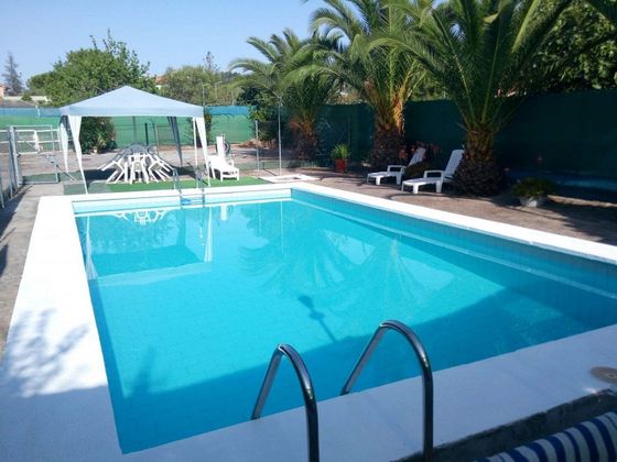 Foto 1 de Chalet en venta en Malpartida de Cáceres de 4 habitaciones con piscina y calefacción