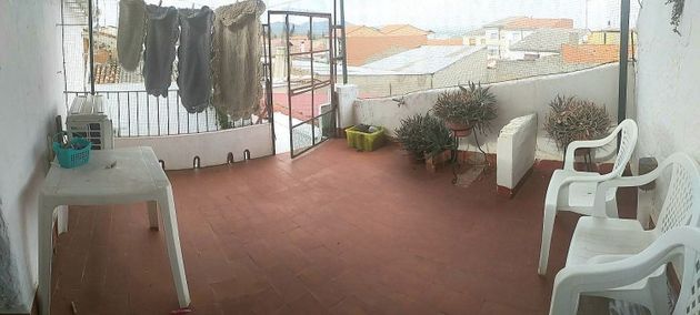 Foto 1 de Venta de casa en Alcuéscar de 4 habitaciones con terraza y aire acondicionado