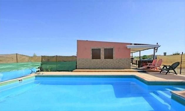 Foto 2 de Casa rural en venta en Pedanías de Cáceres de 2 habitaciones con terraza y piscina