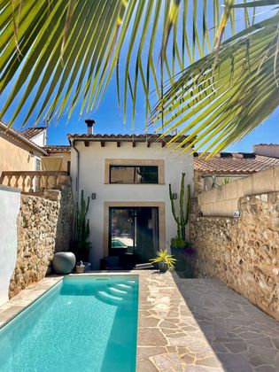Foto 2 de Casa adossada en venda a Sant Joan de 2 habitacions amb terrassa i piscina