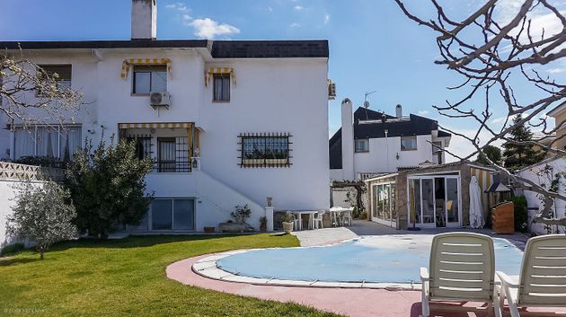 Foto 2 de Venta de casa adosada en El Pilar - Bripac de 6 habitaciones con terraza y piscina