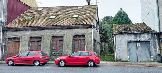 Foto 2 de Casa adossada en venda a calle Trasdeza de 8 habitacions amb garatge