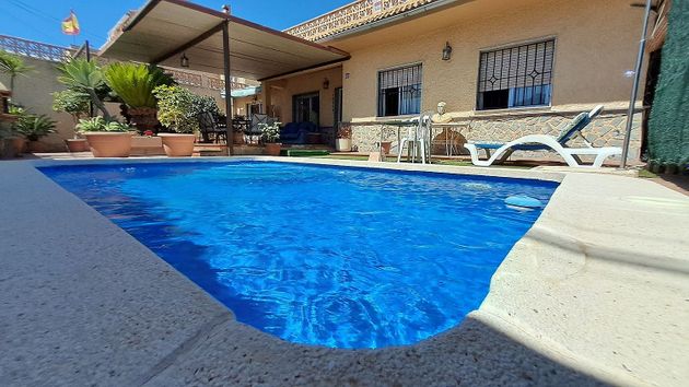 Foto 1 de Venta de chalet en Santiago de la Ribera de 4 habitaciones con terraza y piscina