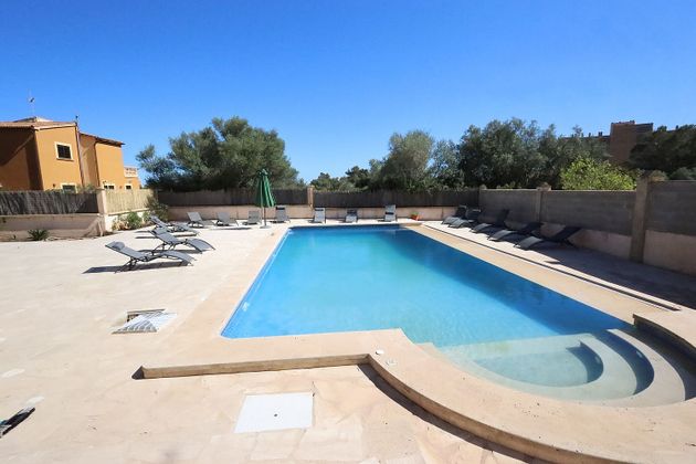 Foto 1 de Casa adossada en venda a Cales de Mallorca de 4 habitacions amb terrassa i piscina