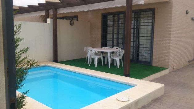 Foto 2 de Casa en venta en Oliva Playa de 2 habitaciones con terraza y piscina