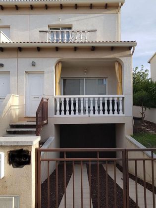 Foto 2 de Venta de casa adosada en Bonavista de 4 habitaciones con terraza y piscina
