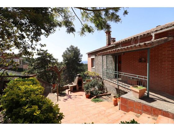 Foto 1 de Casa adossada en venda a Ullastrell de 4 habitacions amb terrassa i jardí