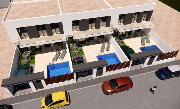 Foto 2 de Casa adossada en venda a avenida Nueva Almería de 3 habitacions amb terrassa i piscina
