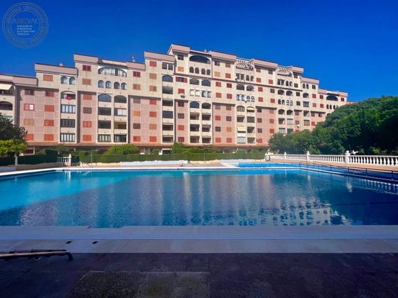 Foto 1 de Venta de piso en Zona Playa de la Concha de 5 habitaciones con terraza y piscina