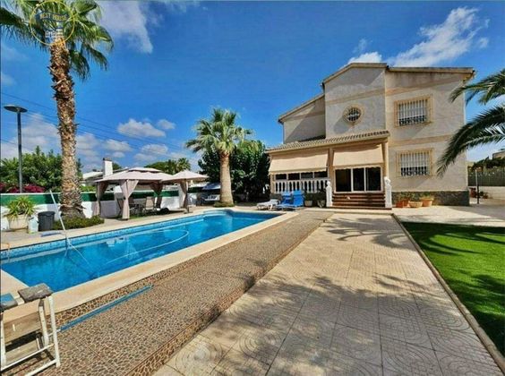 Foto 1 de Casa en venda a Los Girasoles de 5 habitacions amb piscina i jardí