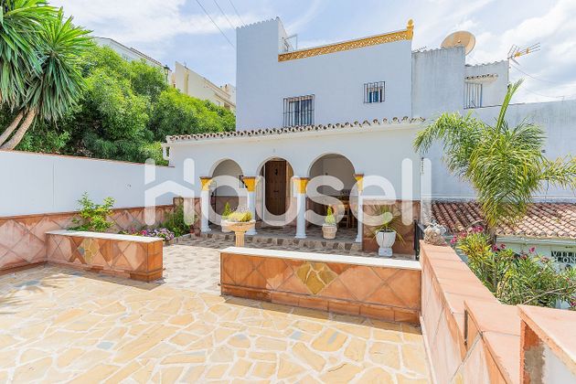Foto 1 de Casa en venta en Manilva de 3 habitaciones con piscina y jardín