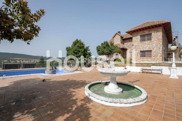 Foto 1 de Casa en venda a Manzanares el Real de 7 habitacions amb terrassa i piscina