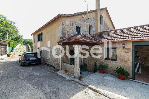 Foto 1 de Casa en venta en Mondariz de 4 habitaciones con garaje y jardín