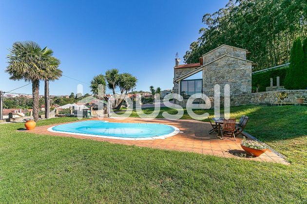 Foto 1 de Casa en venda a Bueu de 3 habitacions amb terrassa i piscina
