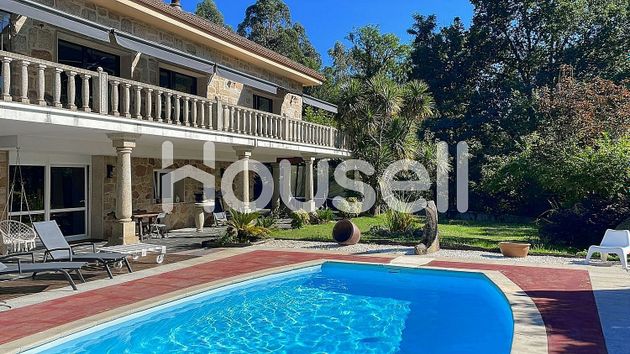 Foto 1 de Casa en venta en Teo de 4 habitaciones con terraza y piscina