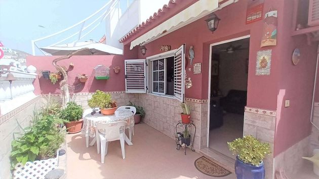 Foto 1 de Casa adosada en venta en Arguineguín de 4 habitaciones con terraza y jardín