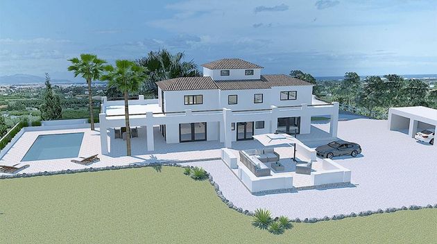 Foto 1 de Casa en venda a Pedreguer de 5 habitacions amb terrassa i piscina