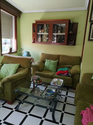 Foto 1 de Casa adossada en venda a Bouzas - Coia de 4 habitacions amb terrassa i calefacció