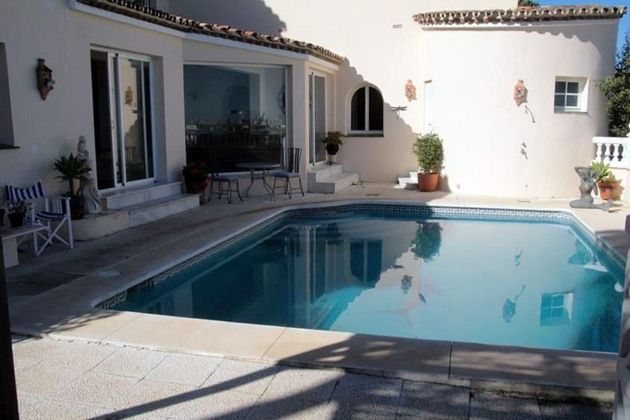 Foto 1 de Xalet en venda a El Castillo de 4 habitacions amb piscina i jardí