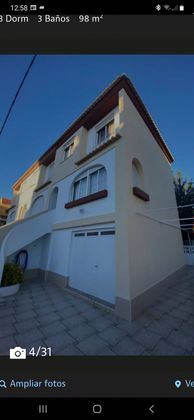 Foto 2 de Casa adosada en venta en Xeraco de 4 habitaciones con terraza y jardín