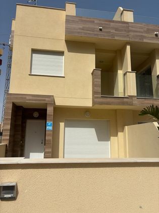 Foto 1 de Casa adosada en venta en Zona Entremares de 2 habitaciones con terraza y piscina