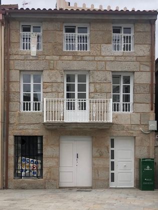 Foto 1 de Casa adosada en venta en calle Suárez Llanos de 2 habitaciones con balcón y calefacción