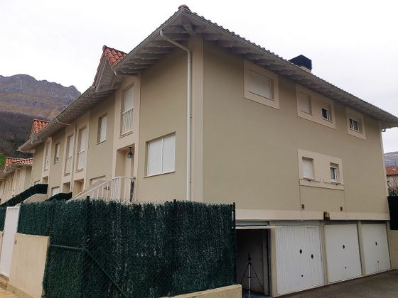 Foto 1 de Casa adosada en venta en calle Arturo Lopez de 2 habitaciones con terraza y piscina