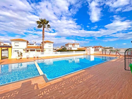 Foto 2 de Ático en venta en Playa Flamenca - Punta Prima de 2 habitaciones con terraza y piscina