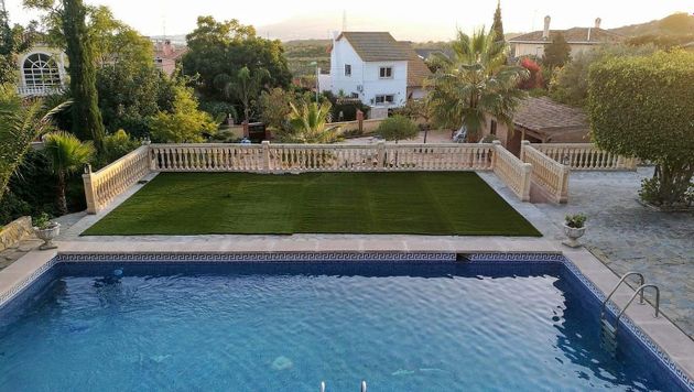 Foto 1 de Xalet en venda a Puerto de la Torre - Atabal de 7 habitacions amb terrassa i piscina