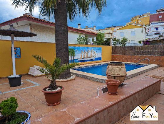 Foto 2 de Venta de chalet en Los Urrutias de 3 habitaciones con terraza y piscina