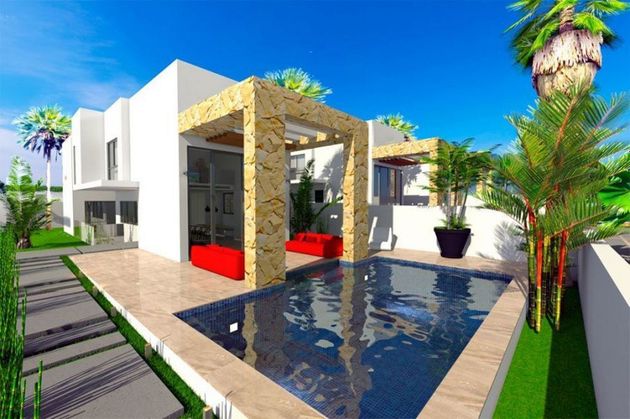 Foto 1 de Xalet en venda a Playa de los Locos de 4 habitacions amb terrassa i piscina