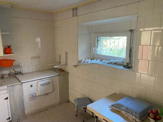 Foto 2 de Casa en venda a calle Doña Jimena de 2 habitacions amb garatge i calefacció