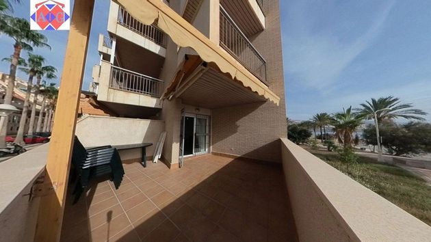 Foto 1 de Venta de piso en Castell de Ferro de 3 habitaciones con terraza y piscina