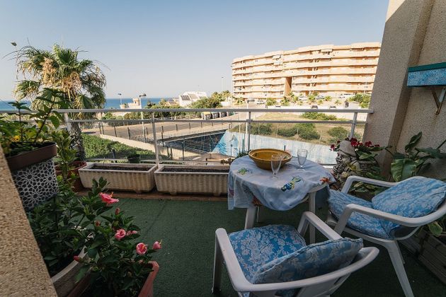 Foto 2 de Piso en venta en calle Montemares de 2 habitaciones con terraza y piscina